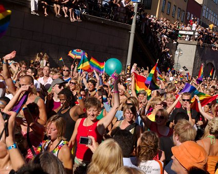 _DSC0096 Happy people parading, waving the rainbow flag.