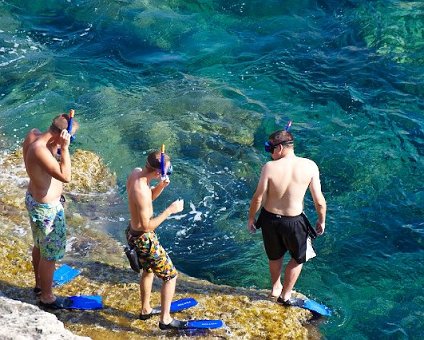 _DSC0025 Boys going snorkeling at the sea caves.