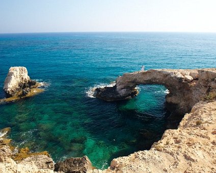 _DSC0039 View at the sea caves area. Markos standing on the natural bridge.