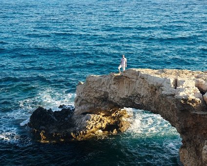 _DSC0100 Arto on a natural bridge at the sea cave.