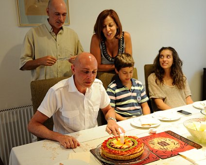 _DSC0027 Markos, Nicos, Andreas, Mina and Ingrid. Markos cutting the birthday cake at Nicos house.