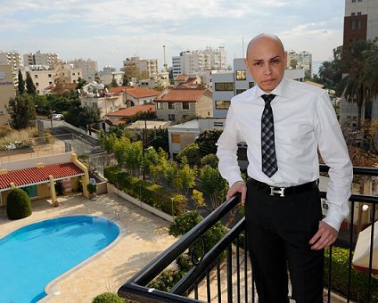 _DSC0058 Markos on the balcony at Curium Palace Hotel.