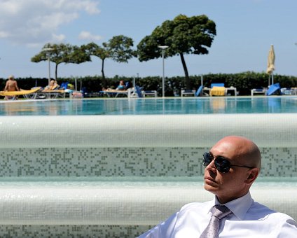 _DSC0009 Markos relaxing by the pool at the hotel in Limassol.