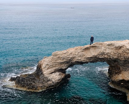 _DSC0035 Markos on the natural bridge over the sea.