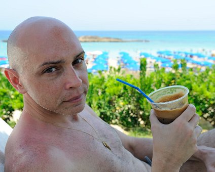 _DSC0003 Markos on the sunlounger drinking frappé.