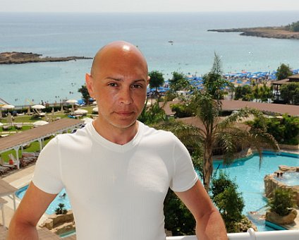 _DSC0006 Markos on the balcony of the hotel room.