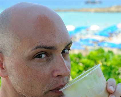 _DSC0013 Markos drinking an ice cold frappé.