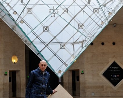 _DSC0032 Markos at the inverted glass pyramid at the Louvre.