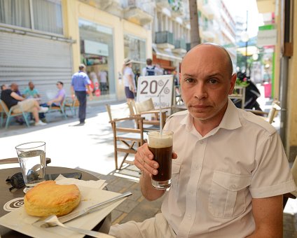 _DSC0013 Markos having coffee at Flo café in Ledra street in Nicosia.