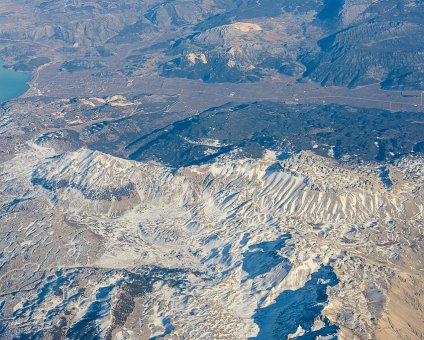 _DSC0009 Flying to Cyprus, above the mountain peaks with snow in Turkey.