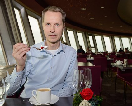 _DSC0098 Arto having dessert in the rotating restaurant Sphere in the TV-tower at Alexanderplatz. At a hight of 207 meters.