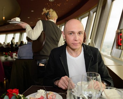 _DSC0105 Markos in the rotating restaurant Sphere in the TV-tower at Alexanderplatz. At a hight of 207 meters.