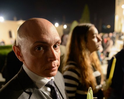 _DSC0050 Markos at church in Limassol at the night of Holy Saturday. Ingrid in the background.