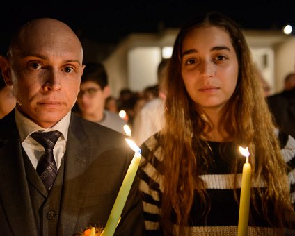 _DSC0061 Markos and Ingrid at church in Limassol at the night of Holy Saturday.