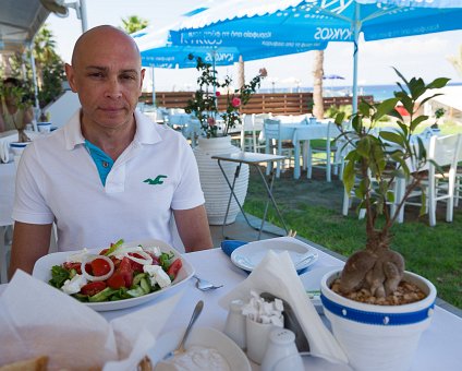 _DSC0007 Markos having lunch at a restaurant by Fig Tree Bay.