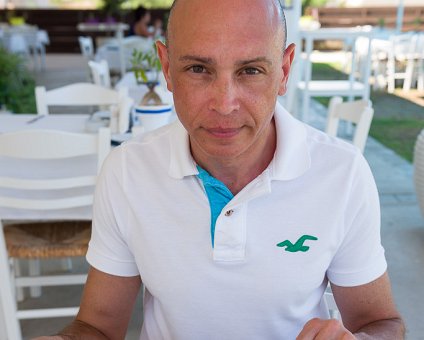 _DSC0022 Markos having lunch at a restaurant by Fig Tree Bay.