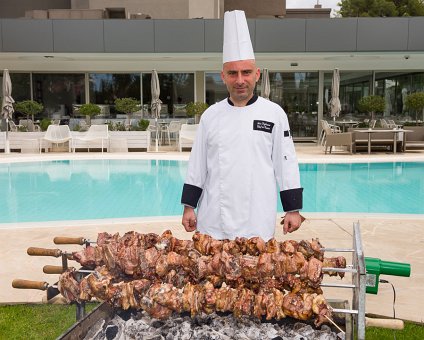 _DSC0049 The chef in charge of the souvla on Easter Sunday at Alasia boutique hotel.