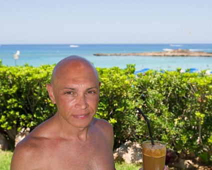 _DSC0400 Markos having frappé at Capo Bay hotel.