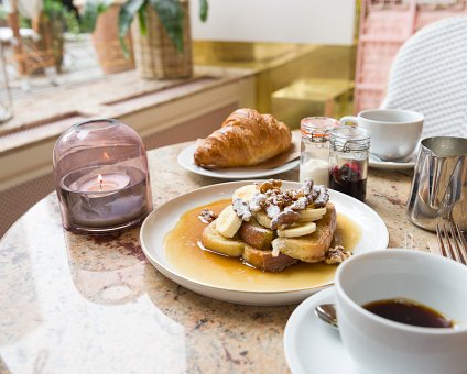 _DSC2896 Morning coffee with croissant and French toast with banana and walnuts at Gretas at the Haymarket hotel.