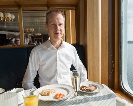 _DSC3237 Arto having breakfast on the boat.