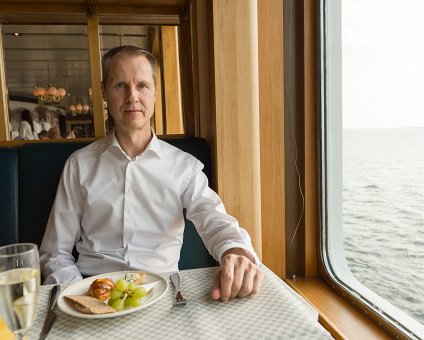 _DSC3246 Arto having breakfast on the boat.