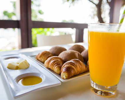 _DSC0172 Breakfast at Capo Bay hotel with fresh orange juice and croissants.