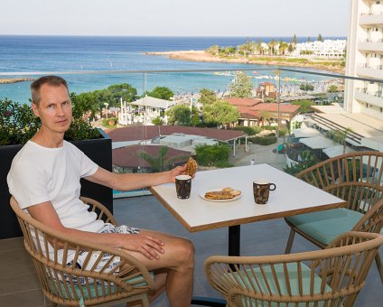 _DSC9362 Arto having coffee on the balcony at Capo Bay hotel.